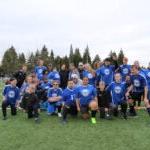 Ingraham High School's Unified Sports soccer team smiling for the camera.